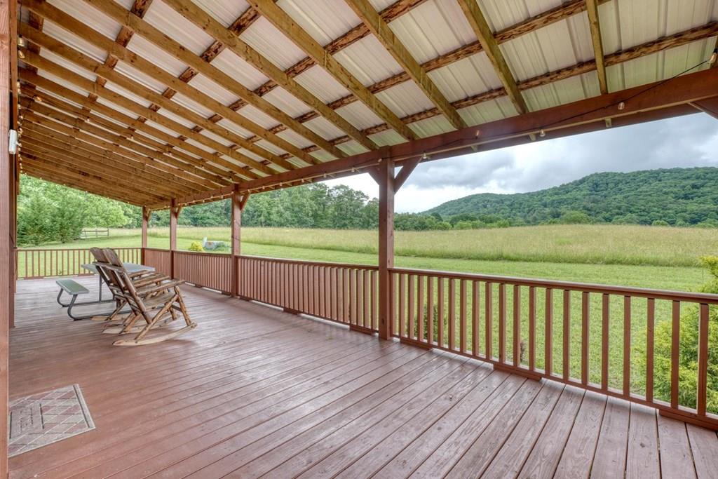 568 Parks Road Hiawassee, GA 30546 - Photo 1 of 38 a view of a patio with wooden floor