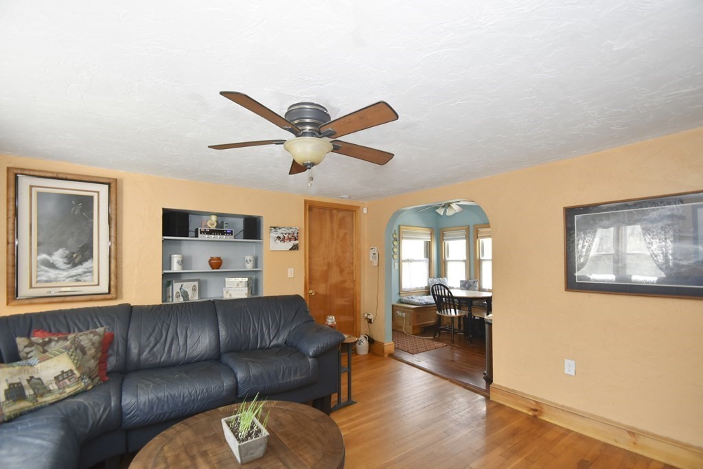 15 Madison Street Boston, MA 02136 - Photo 16 of 28 a living room with furniture and a large window