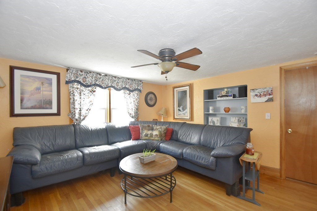 15 Madison Street Boston, MA 02136 - Photo 18 of 28 a living room with furniture and a large window