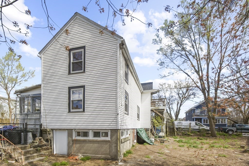 15 Madison Street Boston, MA 02136 - Photo 6 of 28 a view of a house with a yard