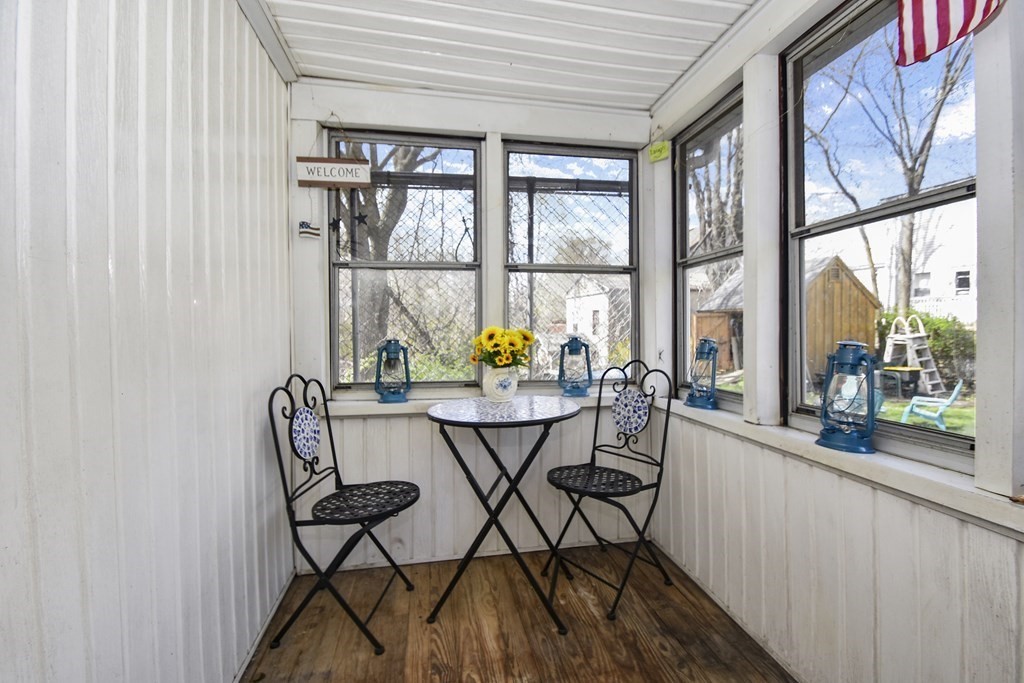 15 Madison Street Boston, MA 02136 - Photo 7 of 28 a view of a dining room with furniture and a window