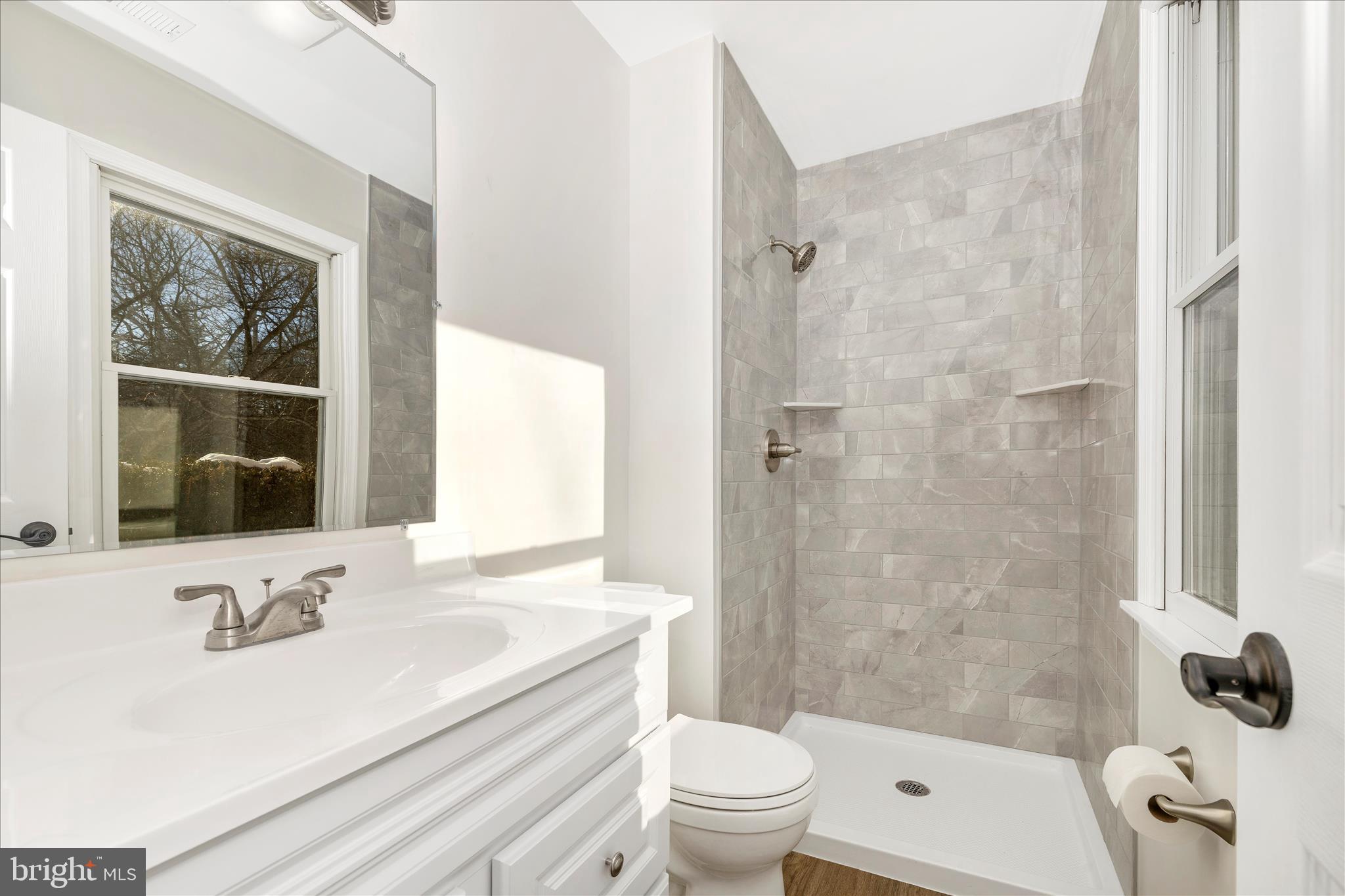 2640 Jefferson Pike Jefferson, MD 21755 - Photo 19 of 63 a bathroom with a sink toilet tub and shower