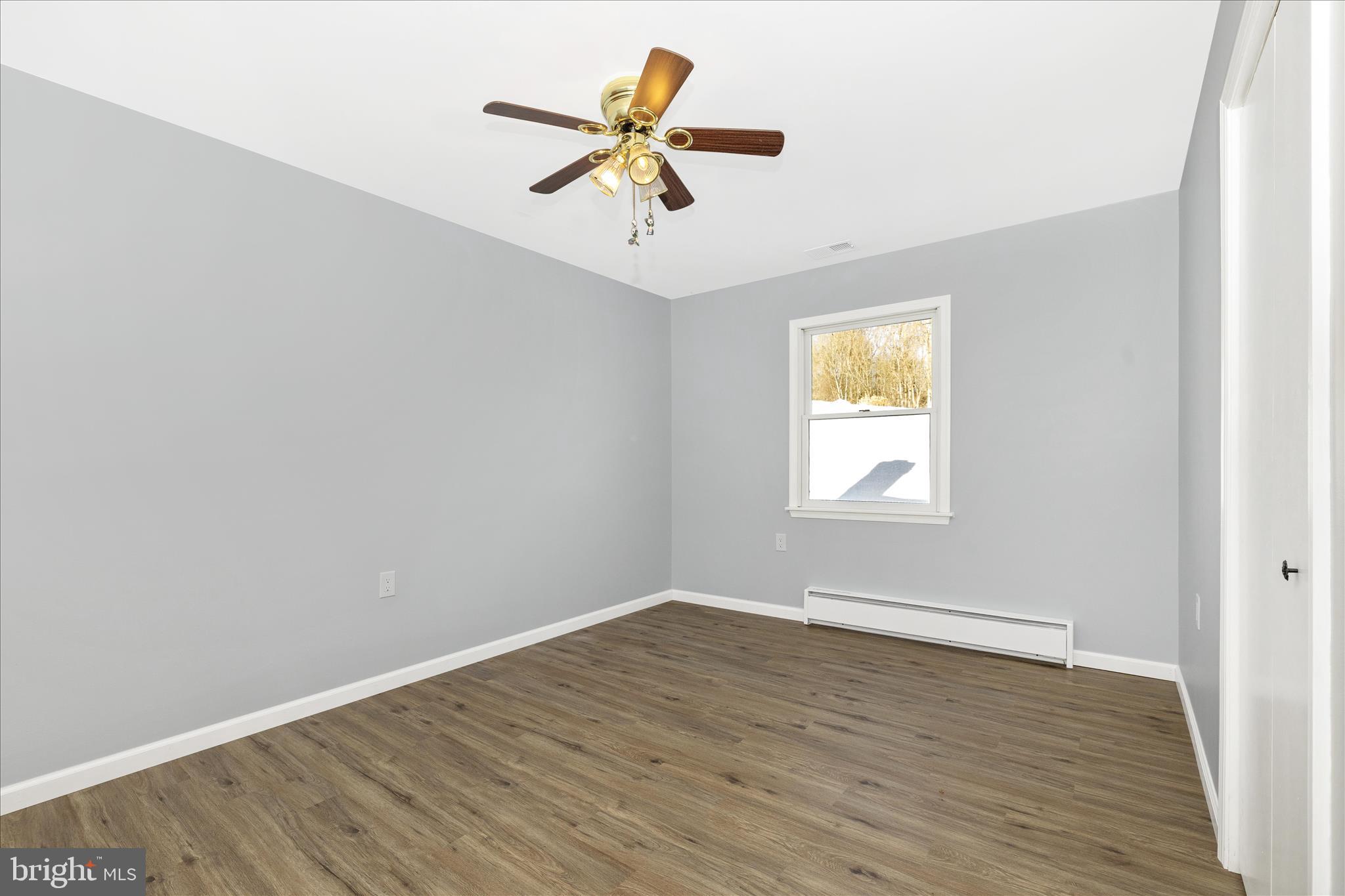 2640 Jefferson Pike Jefferson, MD 21755 - Photo 20 of 63 wooden floor in an empty room with a window