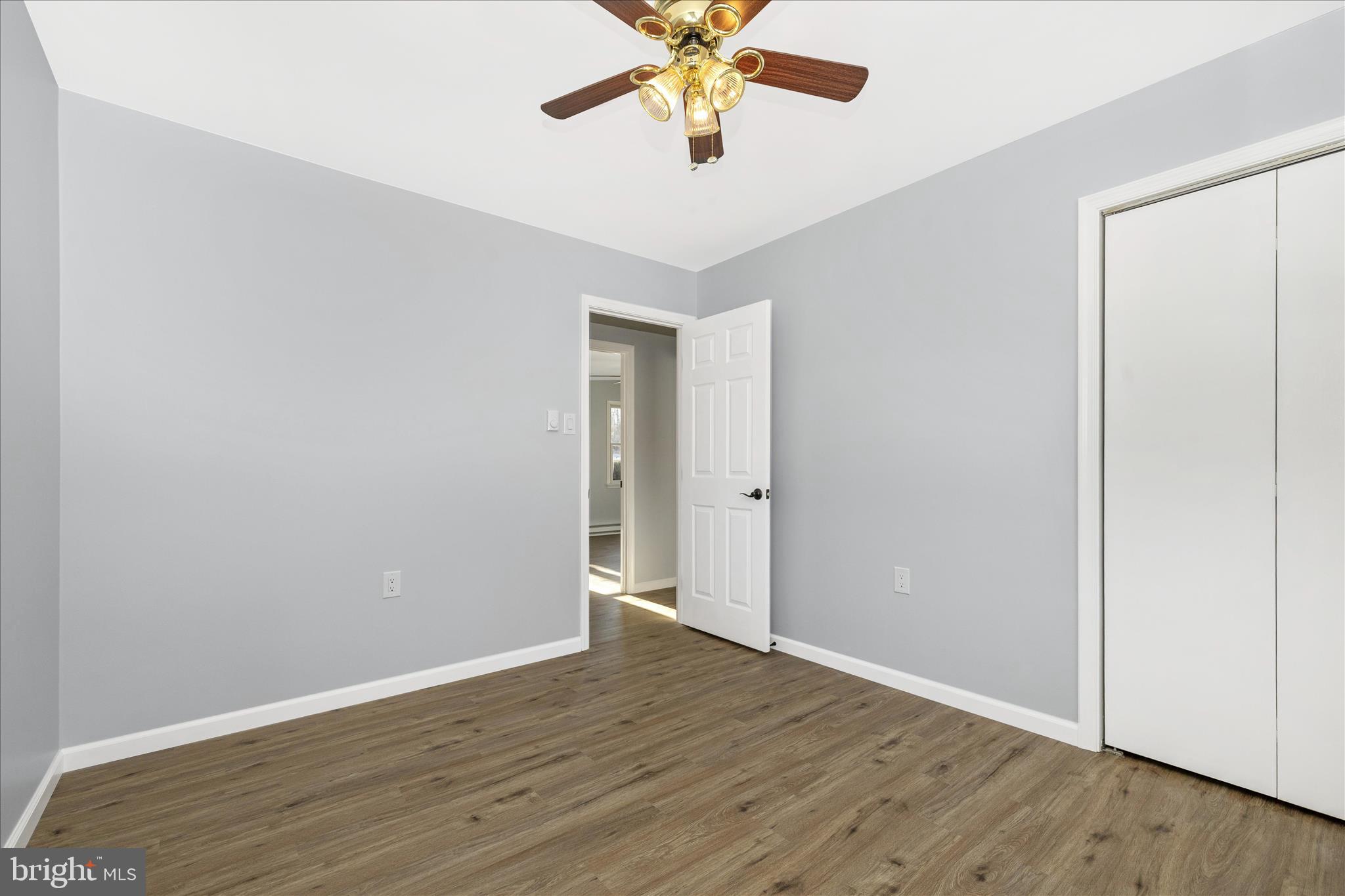 2640 Jefferson Pike Jefferson, MD 21755 - Photo 23 of 63 a view of an empty room with wooden floor
