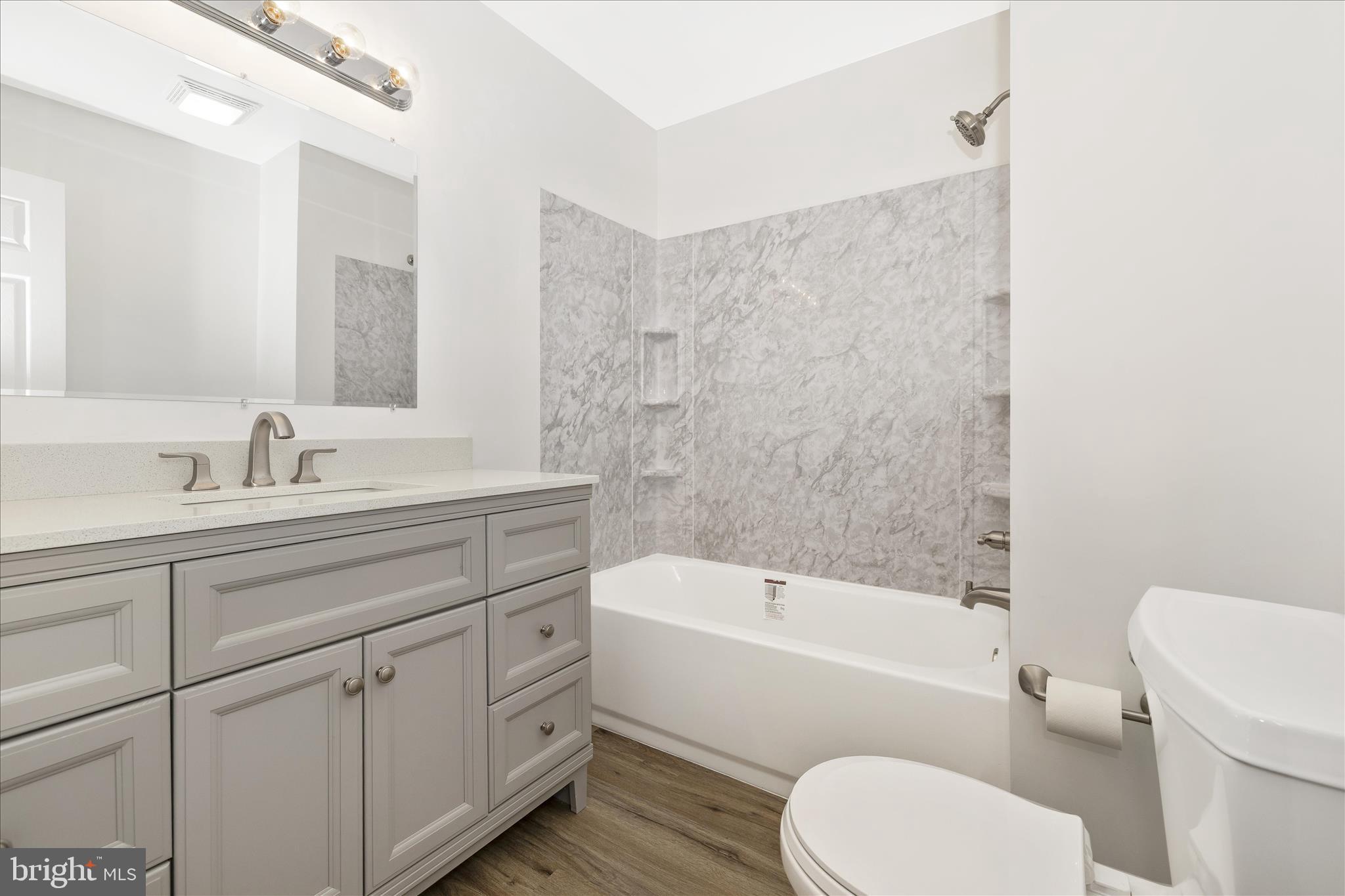 2640 Jefferson Pike Jefferson, MD 21755 - Photo 24 of 63 a bathroom with a sink toilet and bathtub