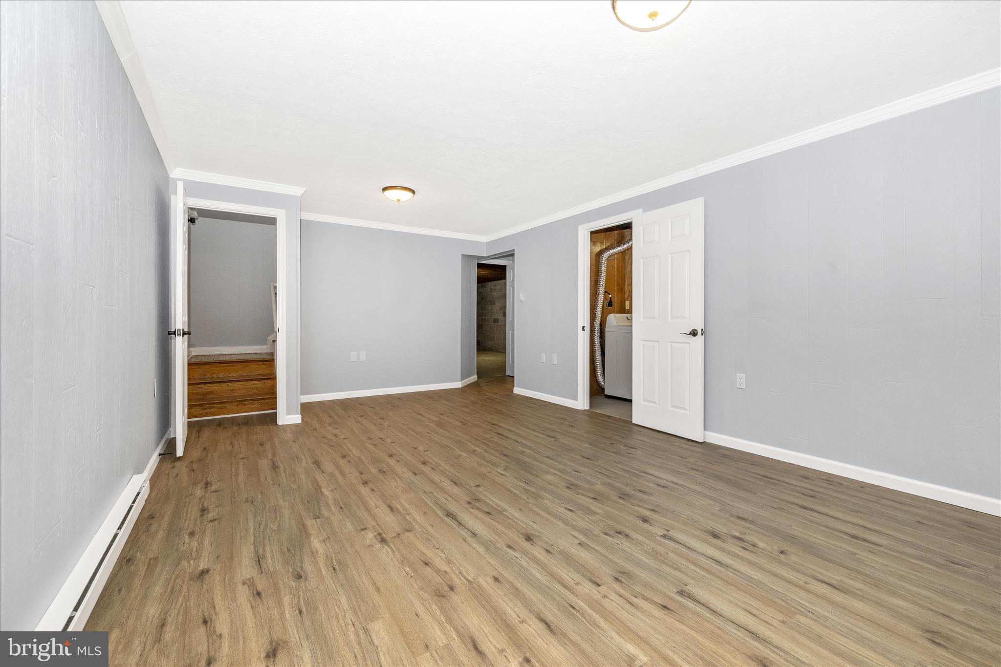 2640 Jefferson Pike Jefferson, MD 21755 - Photo 31 of 63 an empty room with wooden floor and closet