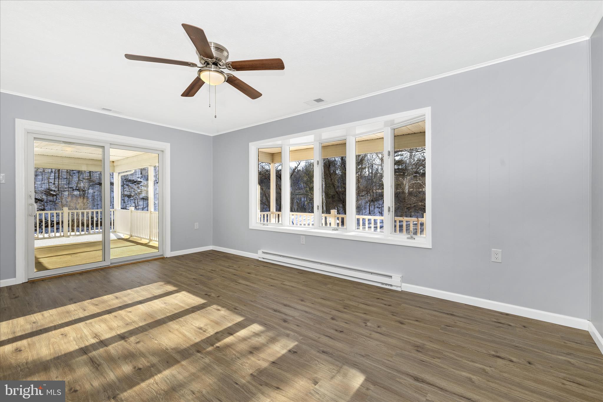 2640 Jefferson Pike Jefferson, MD 21755 - Photo 6 of 63 a view of an empty room with wooden floor and a window