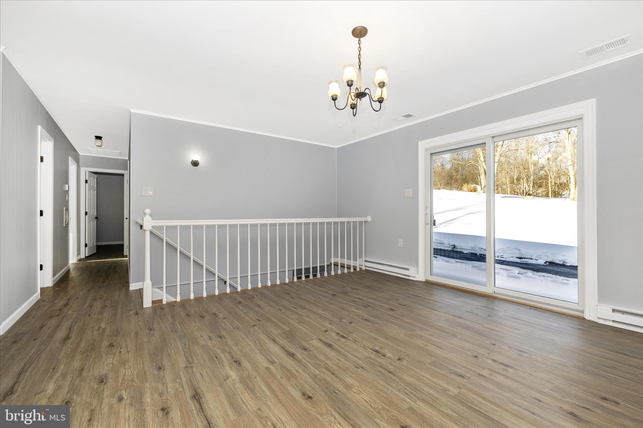 2640 Jefferson Pike Jefferson, MD 21755 - Photo 10 of 63 wooden floor in an empty room with a window