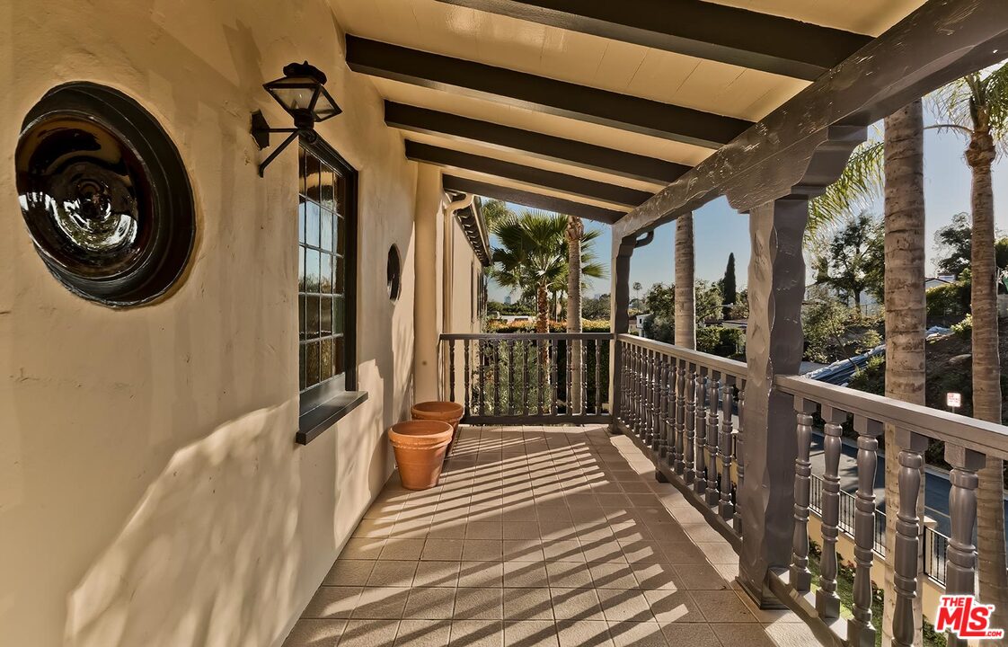 1130 Tower Road Beverly Hills, CA 90210 - Photo 21 of 30 a view of a balcony