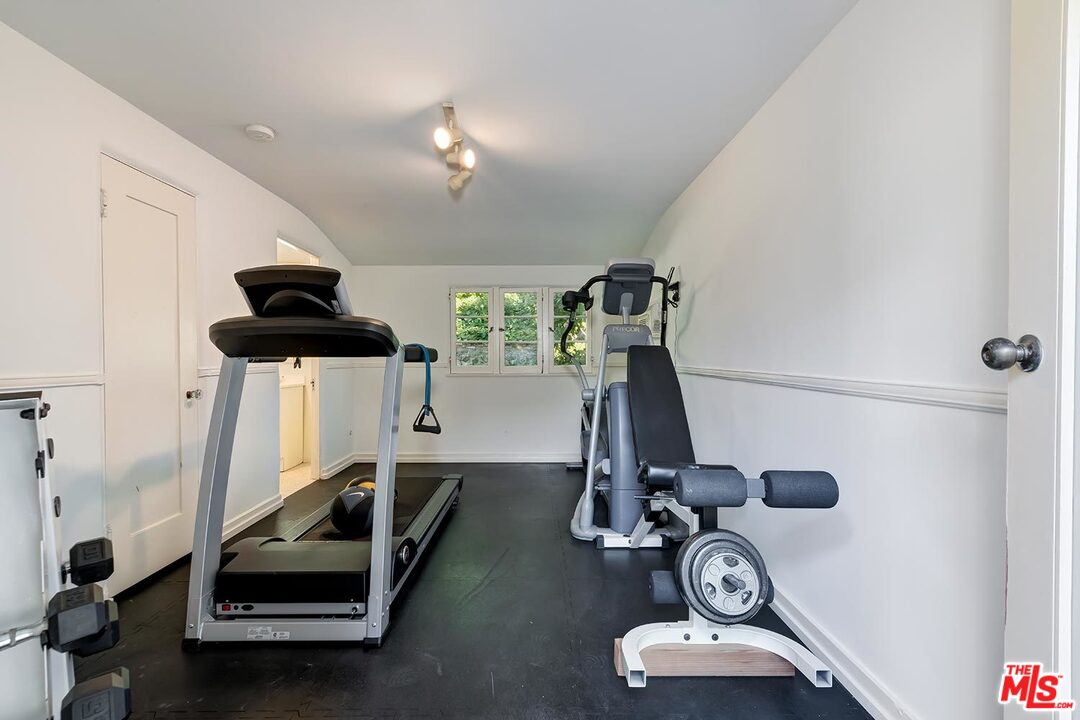 1130 Tower Road Beverly Hills, CA 90210 - Photo 26 of 30 a view of a room with gym equipment