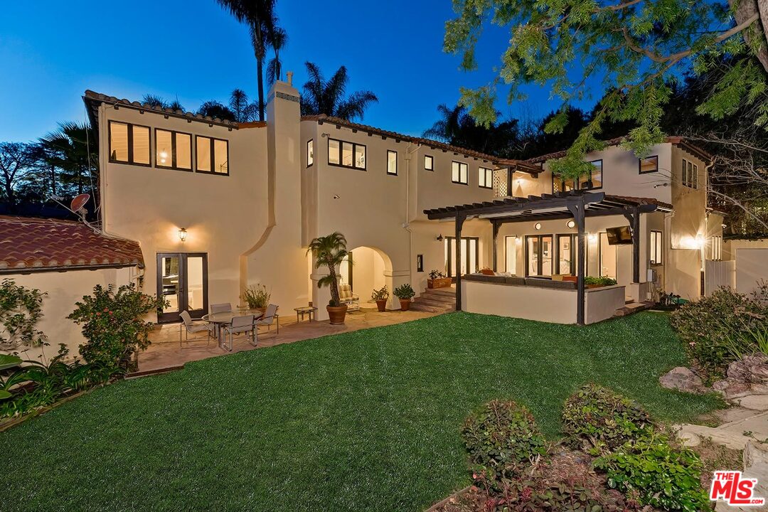 1130 Tower Road Beverly Hills, CA 90210 - Photo 30 of 30 a front view of a house with a garden