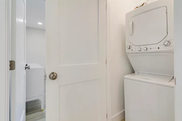 a front view of house with yard and outdoor seating