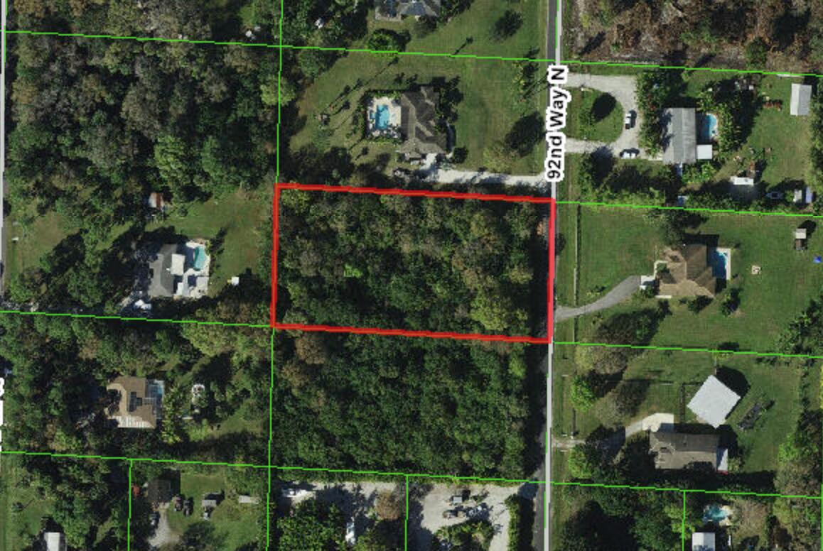 0 92nd Way North Jupiter, FL 33478 - Photo 2 of 6 an aerial view of lake and houses with swimming pool