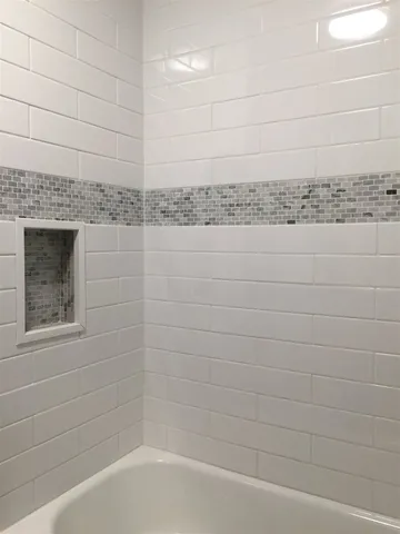 a bathroom with a bathtub