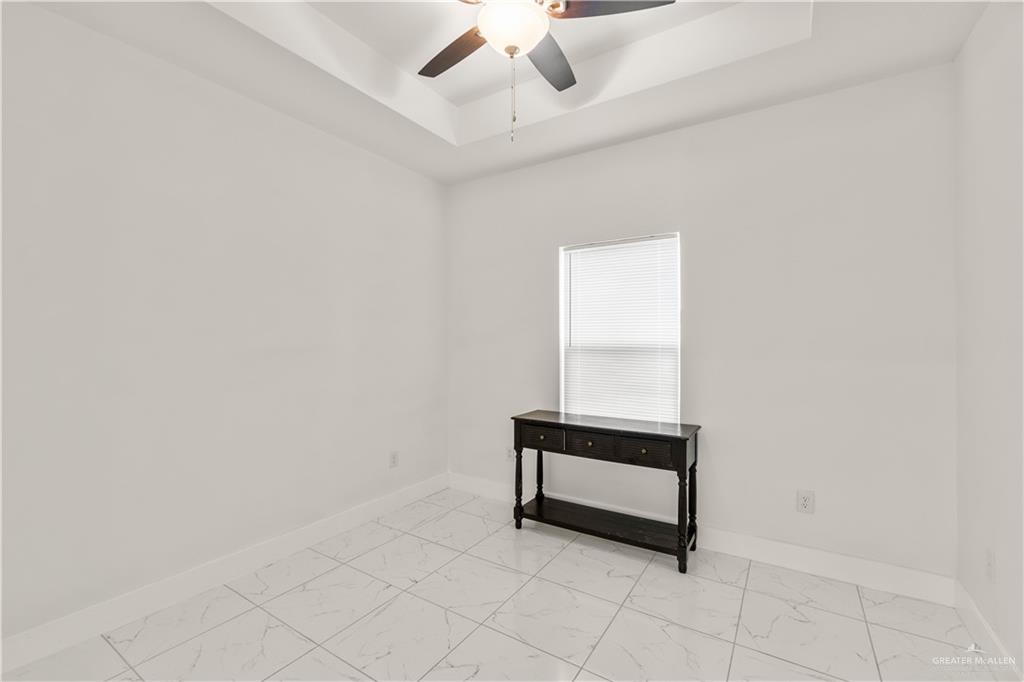 23232 Val Verde Road Edcouch, TX 78538 - Photo 10 of 19 an empty room with fan