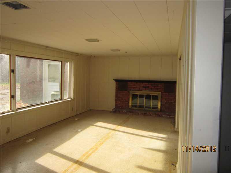 647 C Pittsburgh Road New Brighton, PA 15066 - Photo 8 of 12 Other. Game Room with Walk out and fireplace.