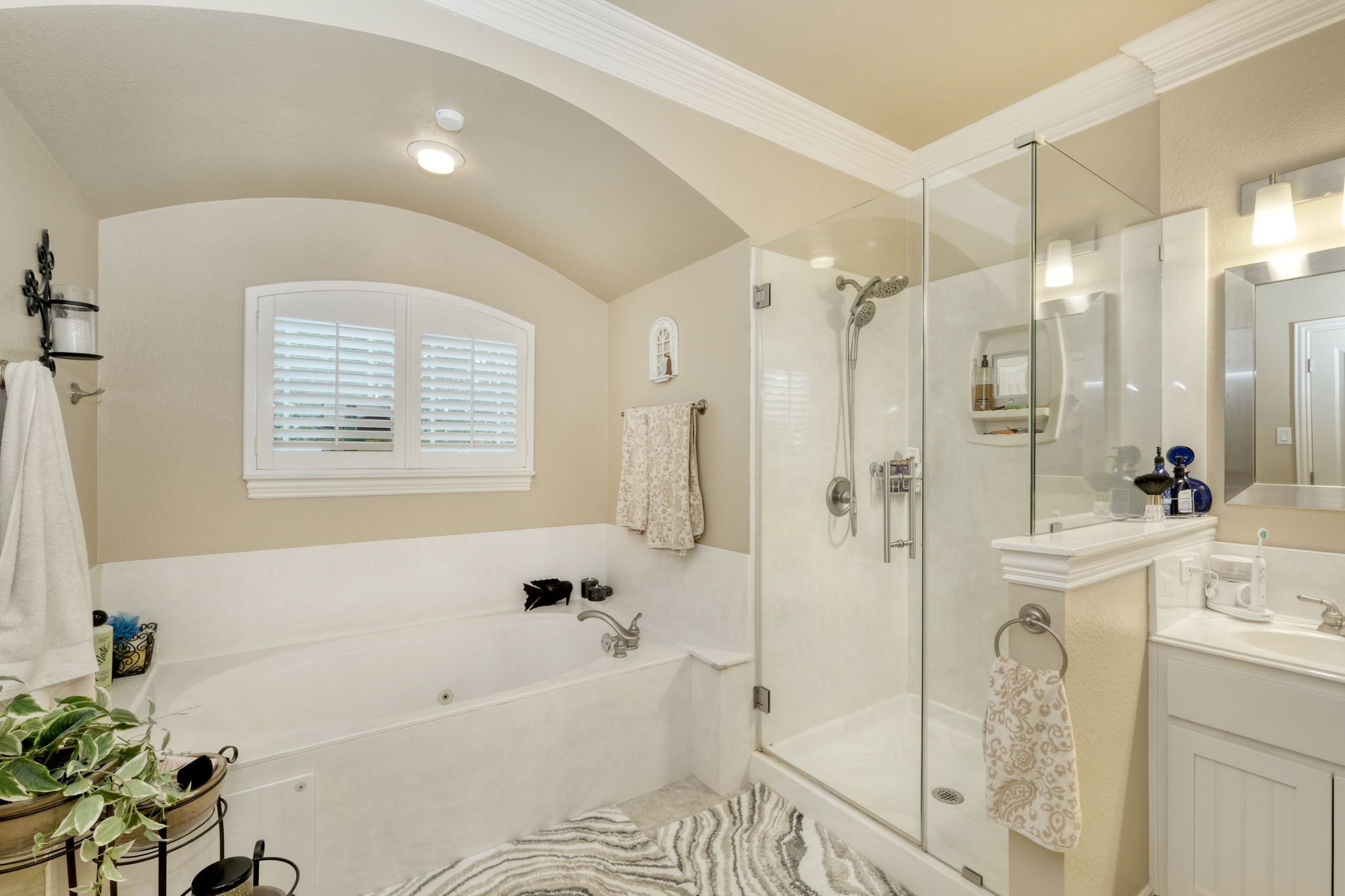 1601 Coronado Leander, TX 78641 - Photo 16 of 37 a bathroom with a tub sink and mirror