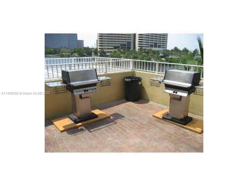 Miami Miami, FL 33126 - Photo 8 of 18 a view of roof deck with chair and barbeque grill