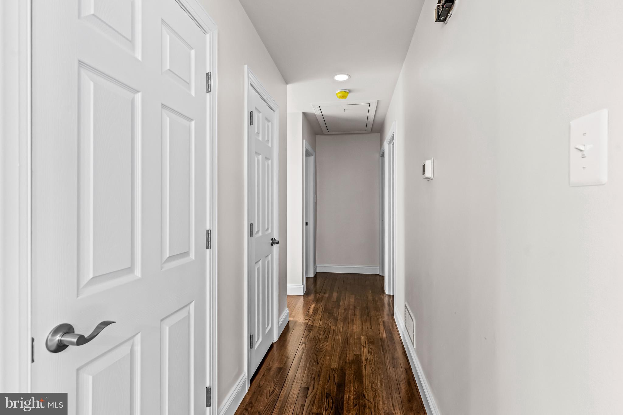 111 Ridge Road Southampton, NJ 08088 - Photo 15 of 47 a view of a hallway with wooden floor and entryway