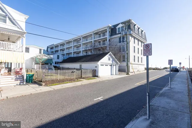 a view of a house with a street