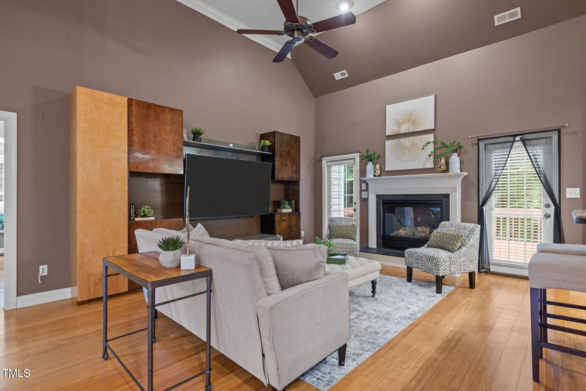61 Fork Junction Road Timberlake, NC 27583 - Photo 11 of 59 a living room with furniture fireplace and a large window
