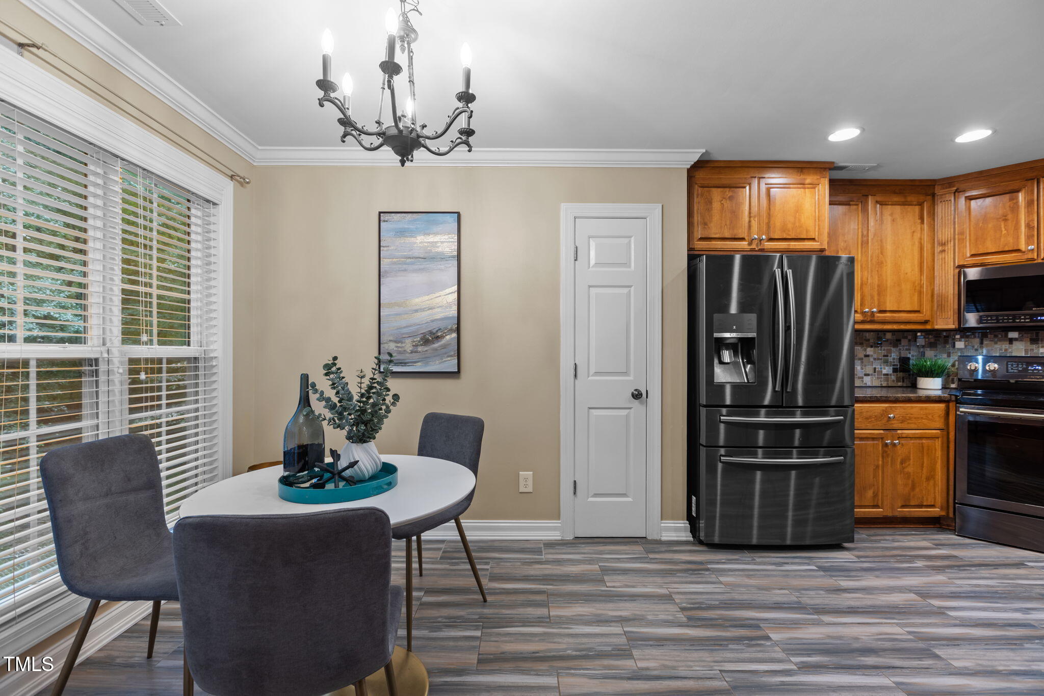 61 Fork Junction Road Timberlake, NC 27583 - Photo 16 of 59 a kitchen with stainless steel appliances granite countertop a refrigerator and a stove top oven