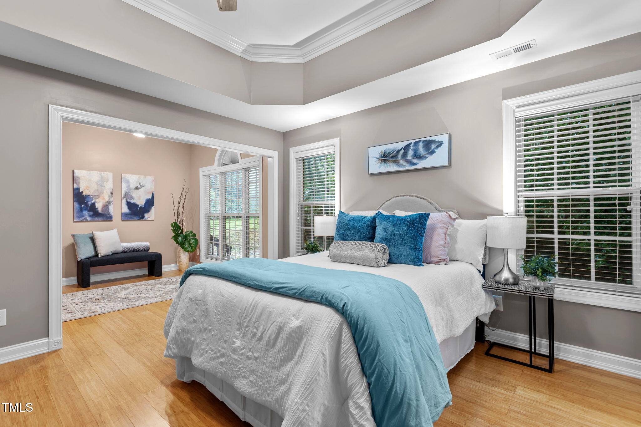 61 Fork Junction Road Timberlake, NC 27583 - Photo 22 of 59 a spacious bedroom with a bed and a couch