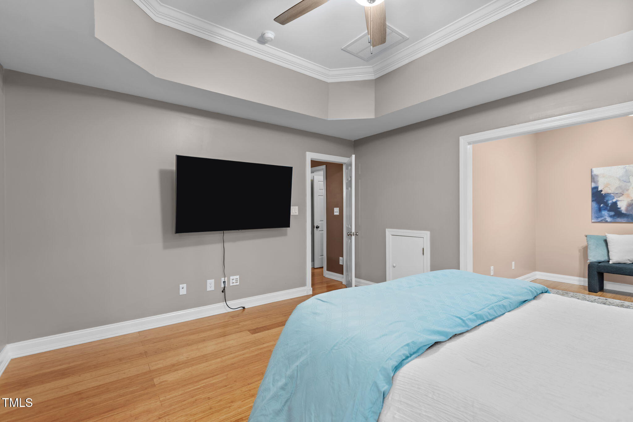 61 Fork Junction Road Timberlake, NC 27583 - Photo 23 of 59 a bedroom with a bed and a flat screen tv