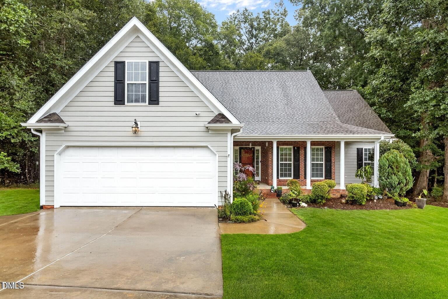 61 Fork Junction Road Timberlake, NC 27583 - Photo 2 of 59 a front view of house with yard and green space