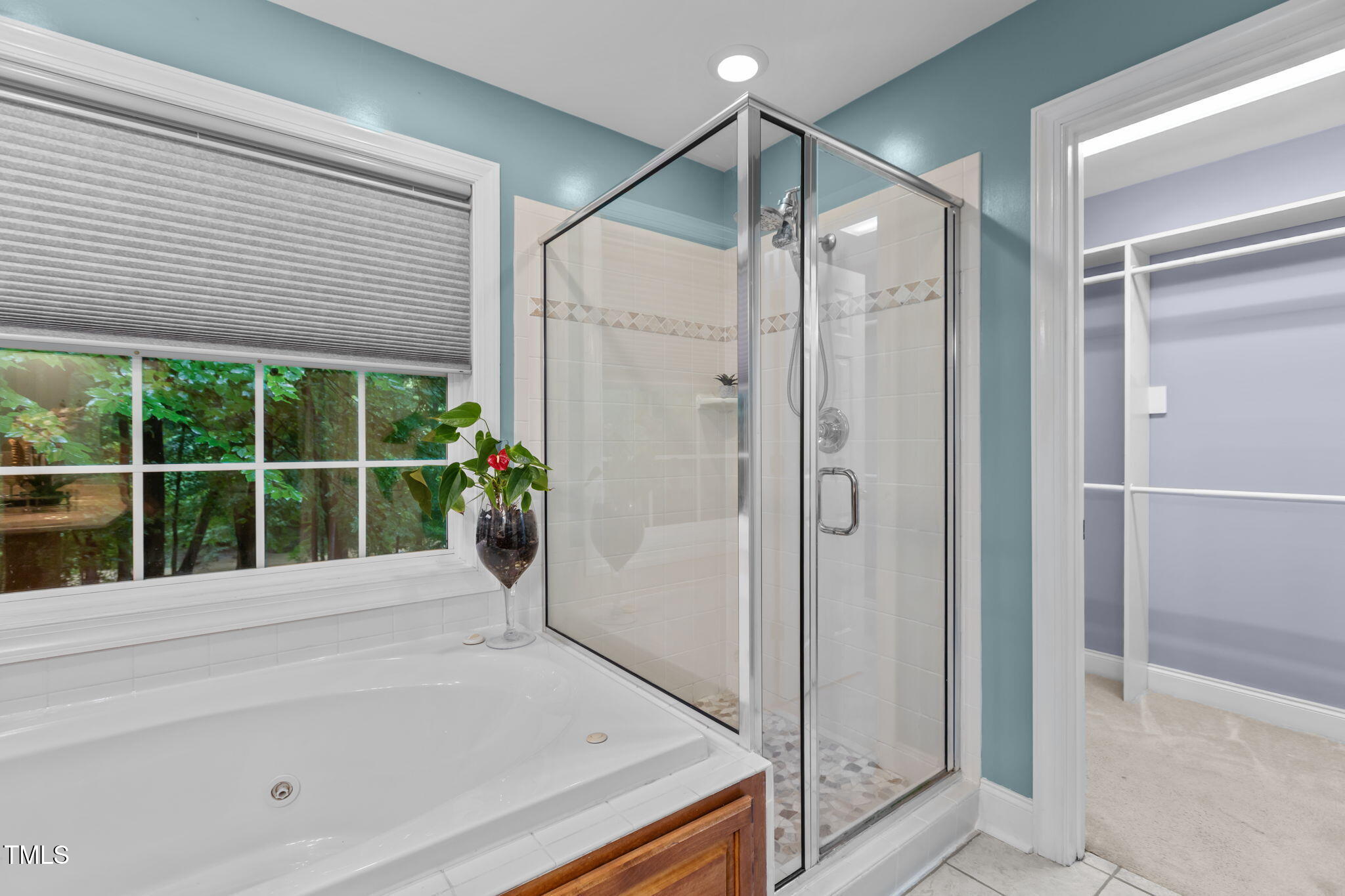 61 Fork Junction Road Timberlake, NC 27583 - Photo 27 of 59 a bathroom with a tub and shower