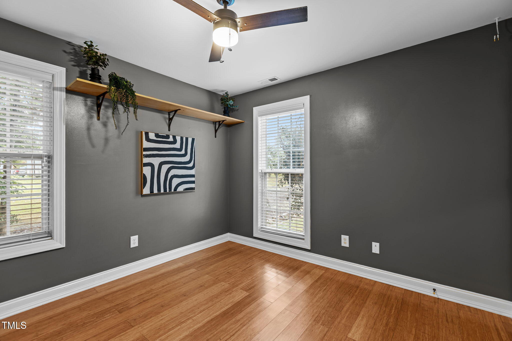 61 Fork Junction Road Timberlake, NC 27583 - Photo 30 of 59 an empty room with windows and fan