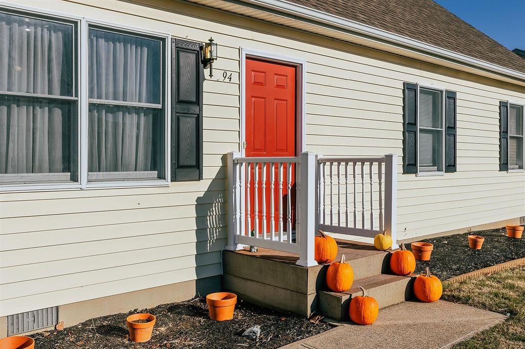 94 Buckboard Road Waynesboro, VA 22980 - Photo 6 of 33 a backyard of a house with barbeque oven table and chairs