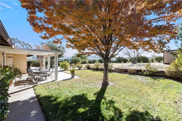 a view of a house with snow in the yard