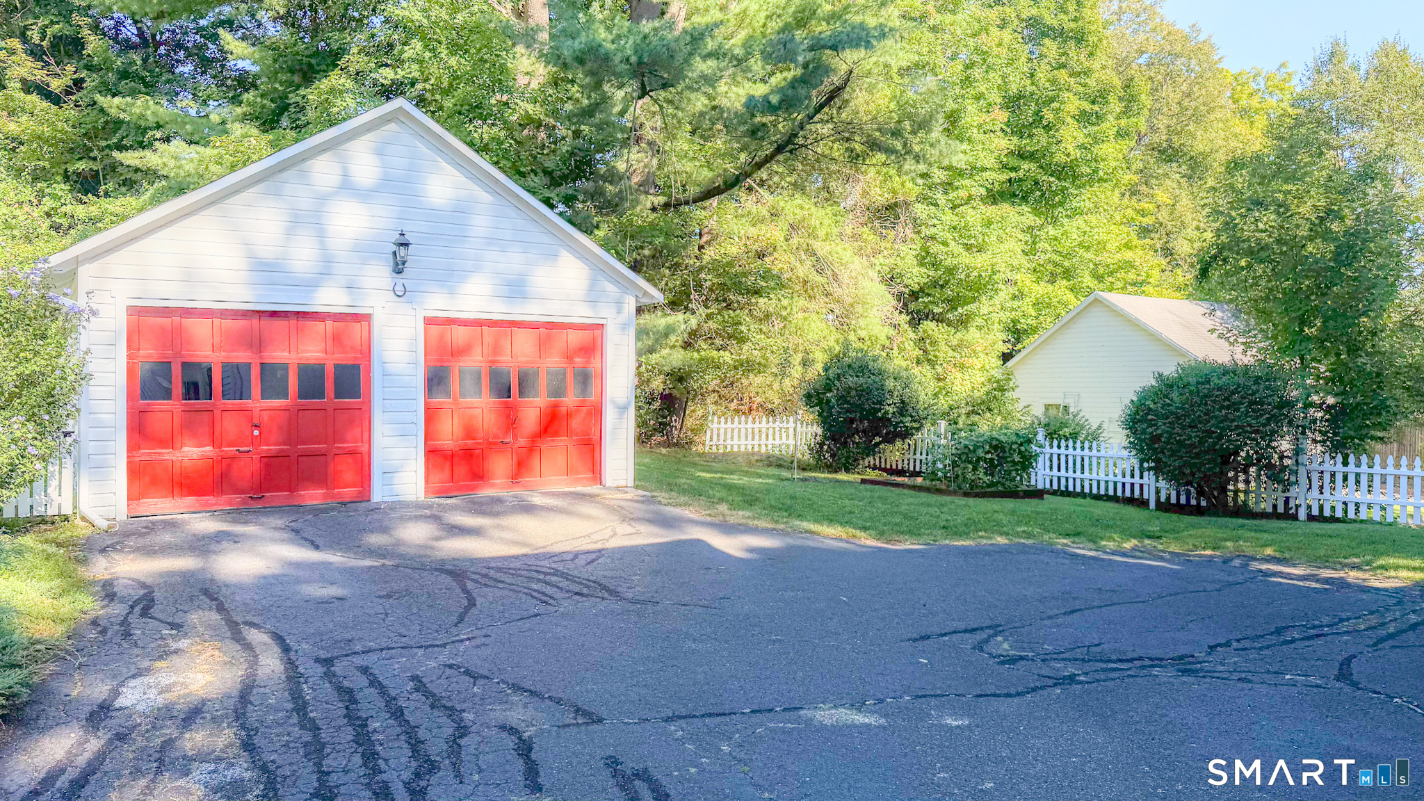 34 Hamilton Avenue Watertown, CT 06795 - Photo 2 of 17 a view of basketball place in front of house