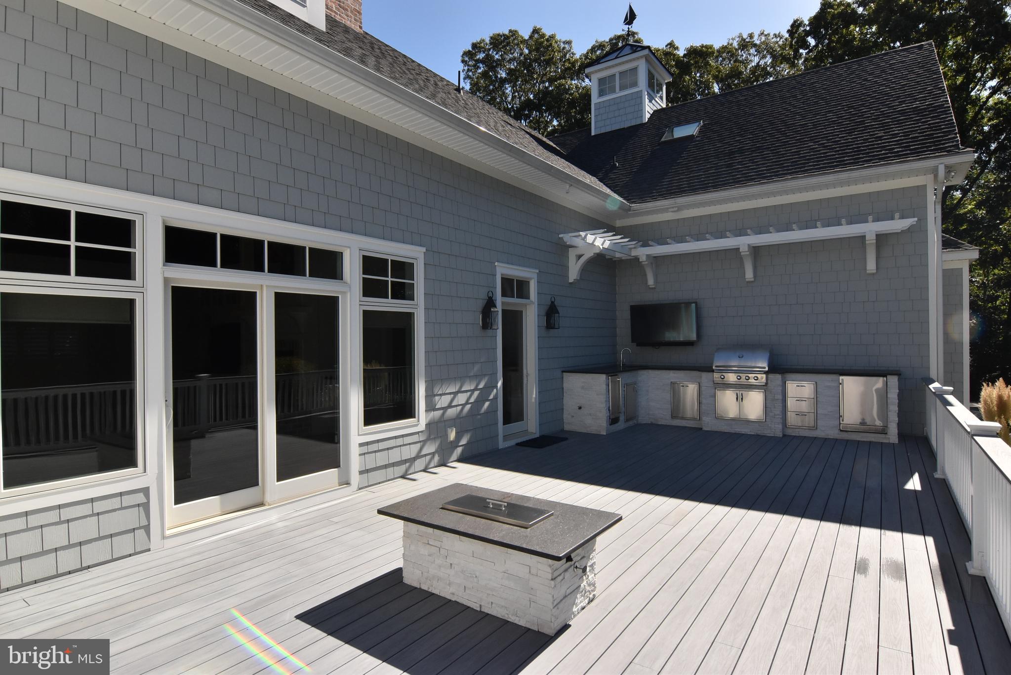 35566 Peregrine Road Lewes, DE 19958 - Photo 55 of 78 Firepit and Outdoor Kitchen