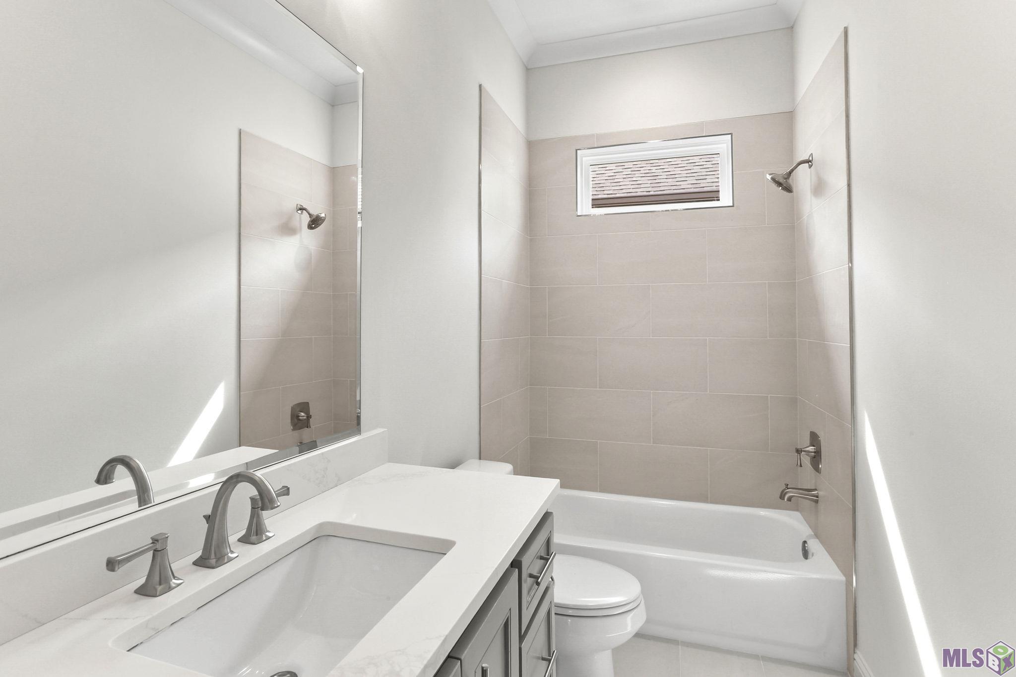 4439 Camargue Avenue Baton Rouge, LA 70820 - Photo 16 of 17 Guest Bathroom