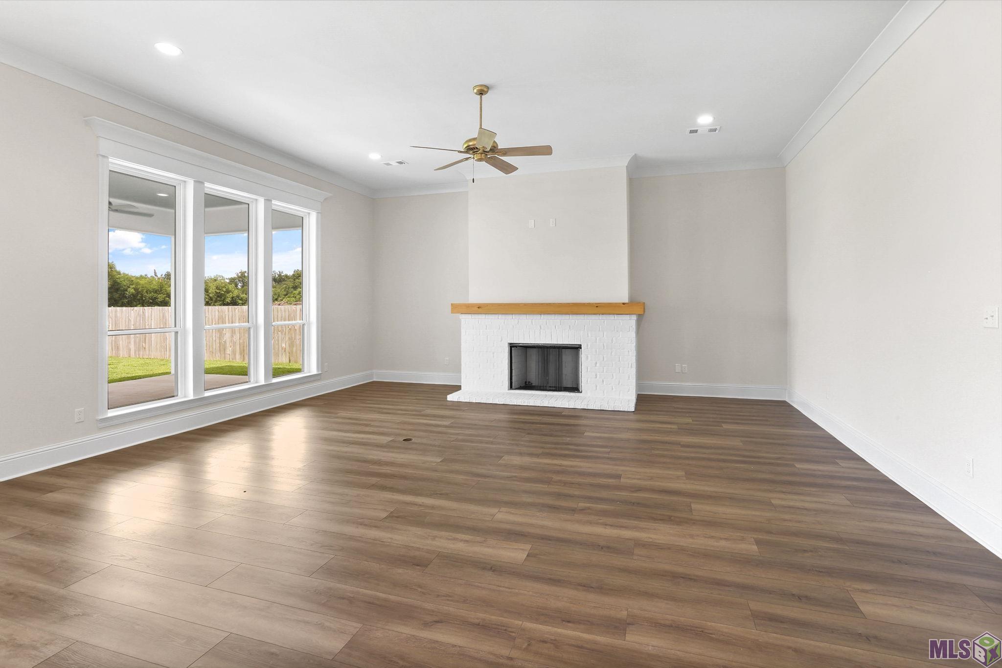 4439 Camargue Avenue Baton Rouge, LA 70820 - Photo 3 of 17 Over Sized Den with Gas Fireplace