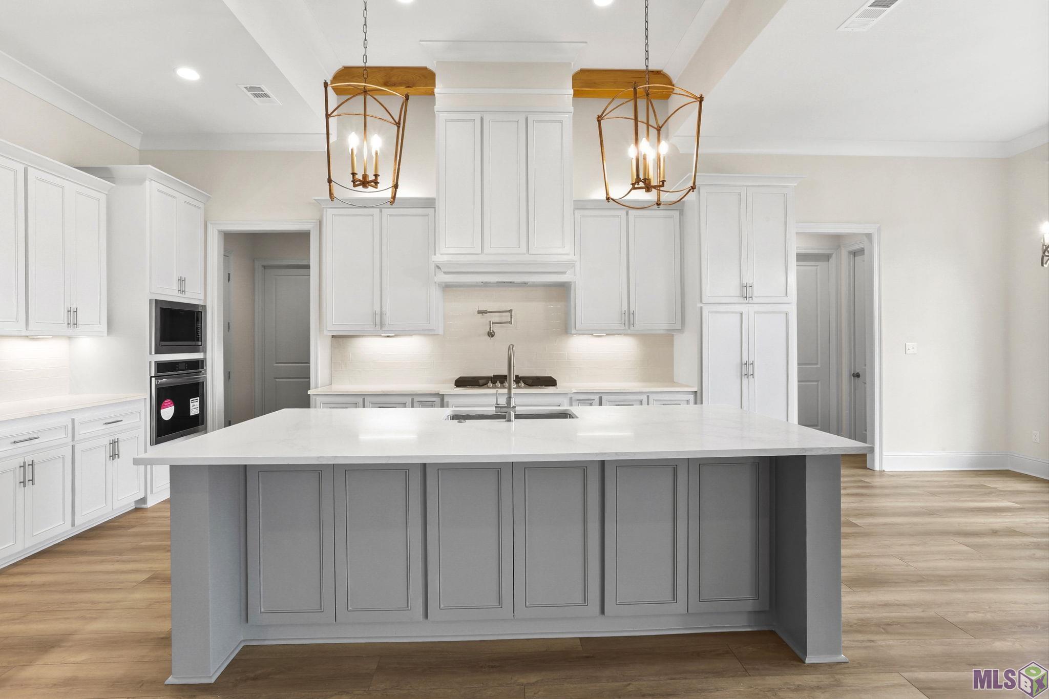 4439 Camargue Avenue Baton Rouge, LA 70820 - Photo 8 of 17 Over and Under counter lighting