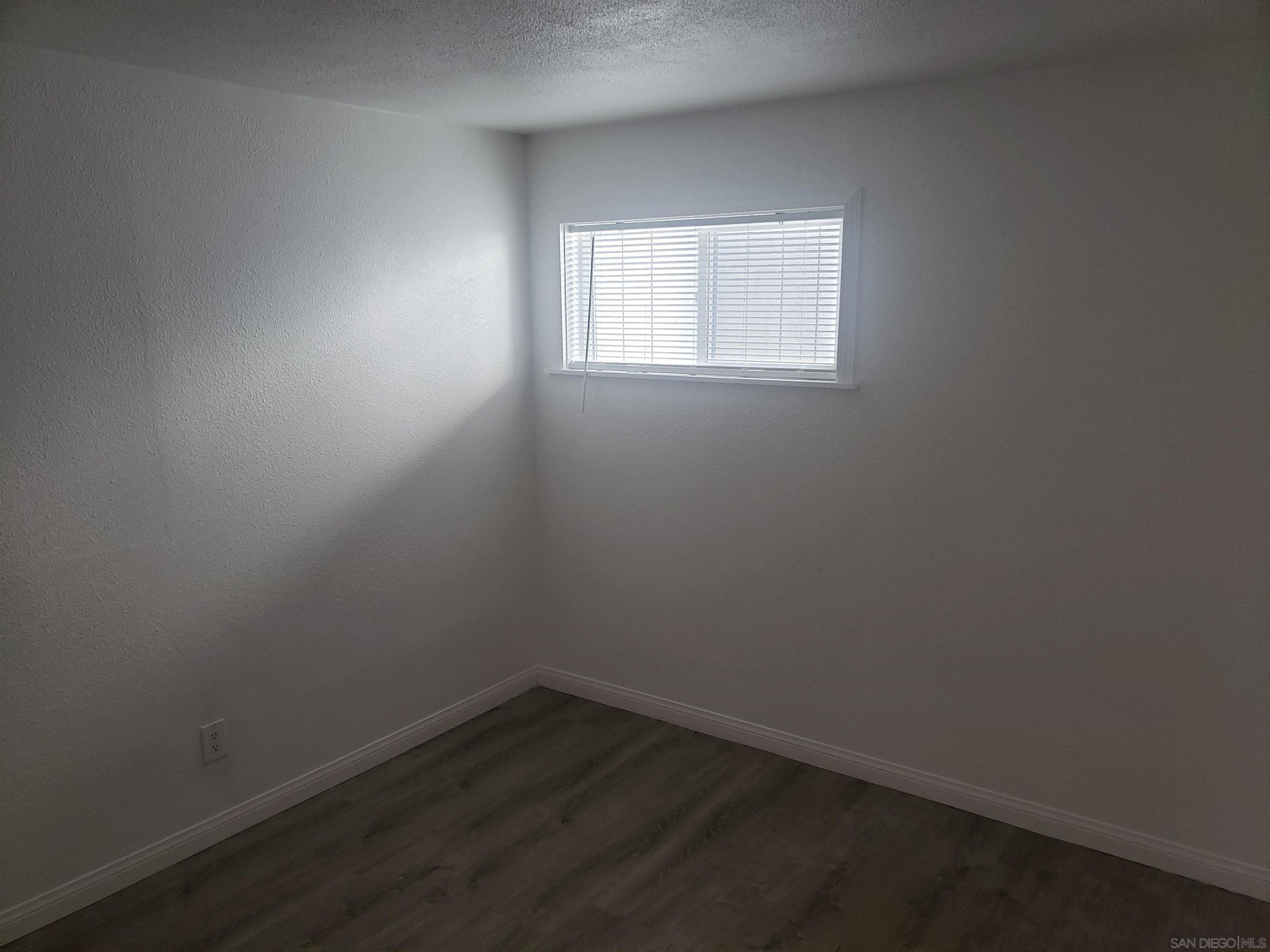 1207 Lyons Lane El Cajon, CA 92021 - Photo 14 of 39 an empty room with a window