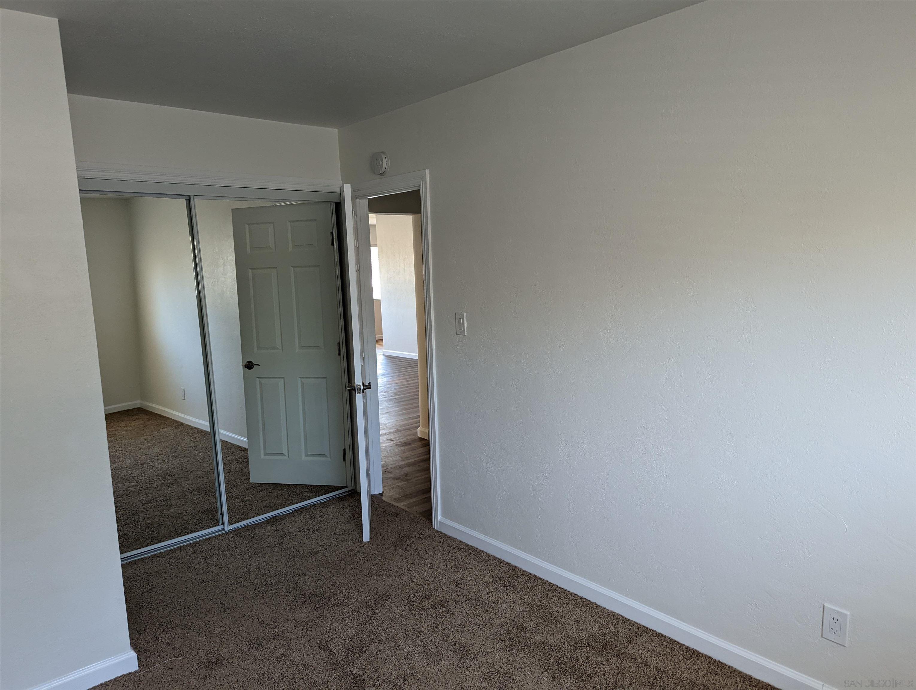 1207 Lyons Lane El Cajon, CA 92021 - Photo 15 of 39 an empty room with closet