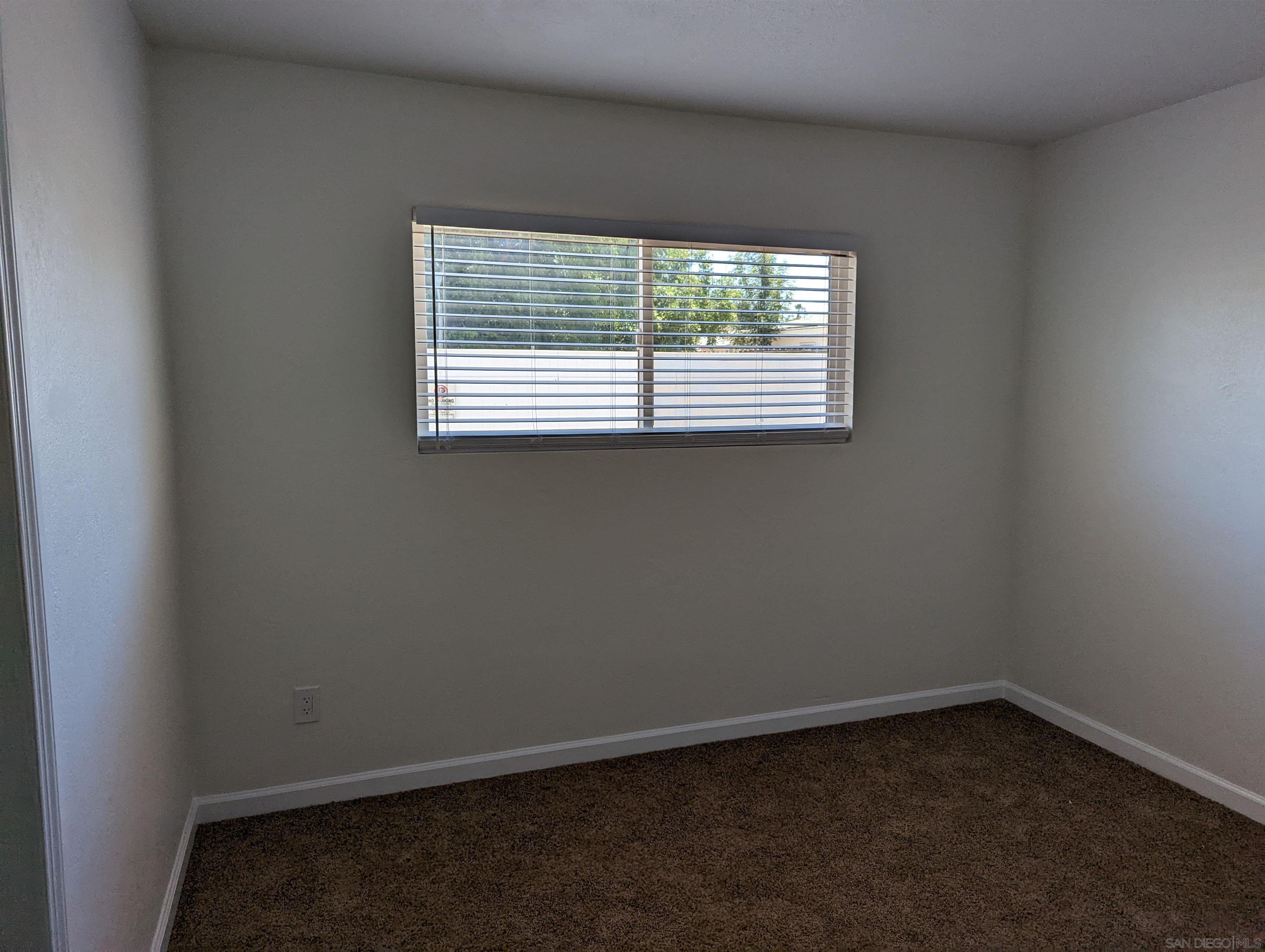 1207 Lyons Lane El Cajon, CA 92021 - Photo 20 of 39 an empty room with a window