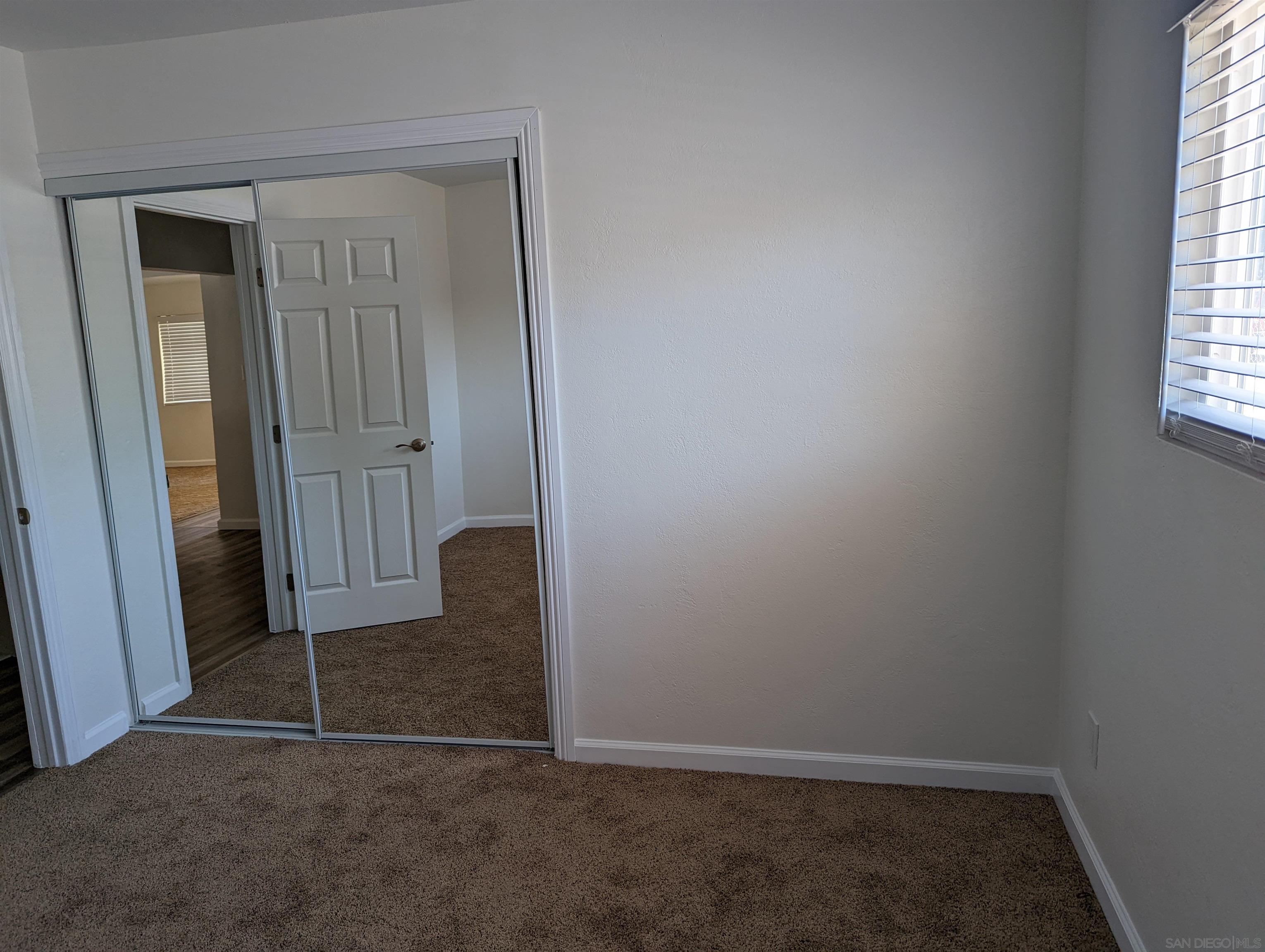 1207 Lyons Lane El Cajon, CA 92021 - Photo 32 of 39 an empty room with windows