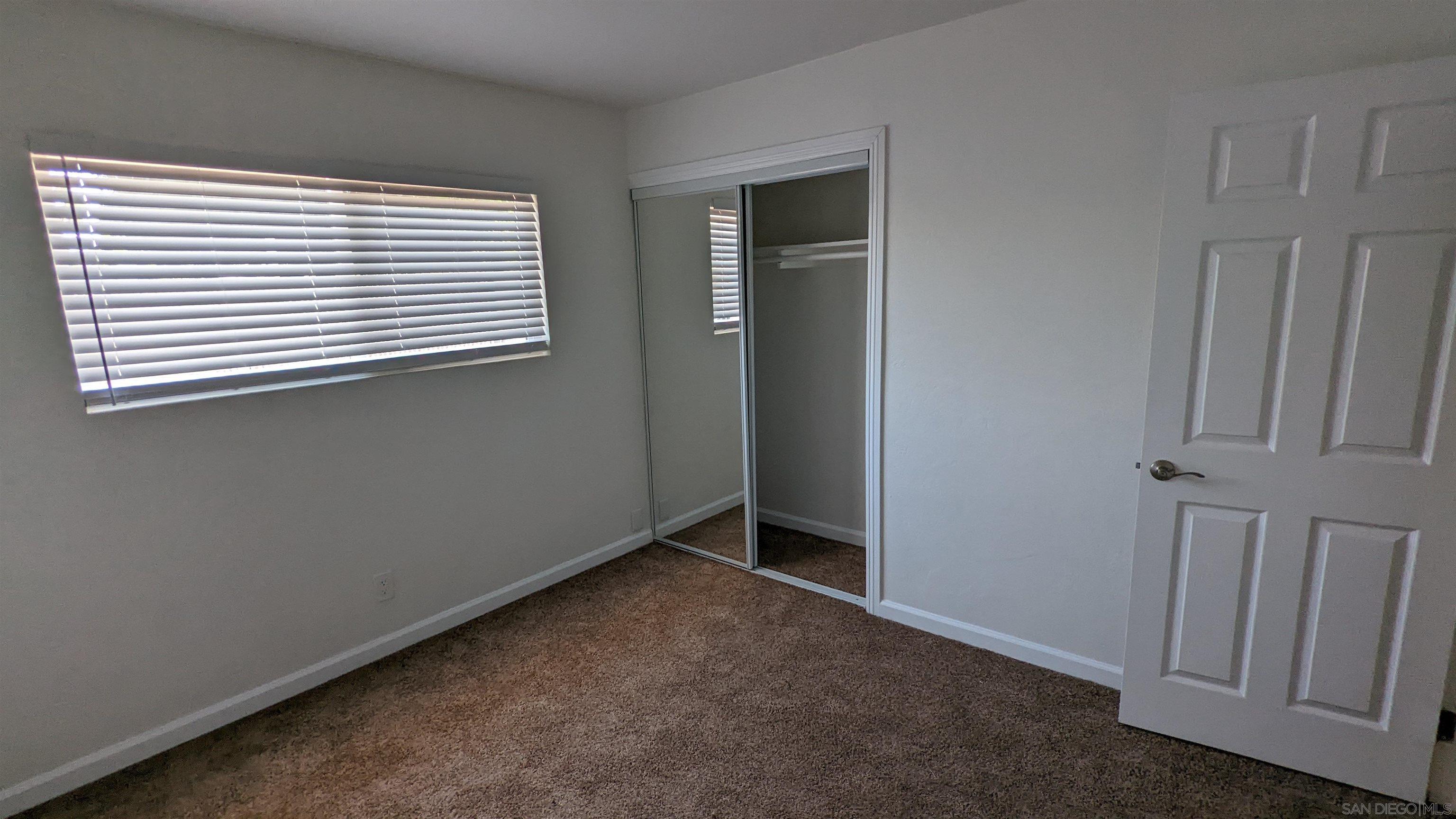1207 Lyons Lane El Cajon, CA 92021 - Photo 35 of 39 an empty room with windows