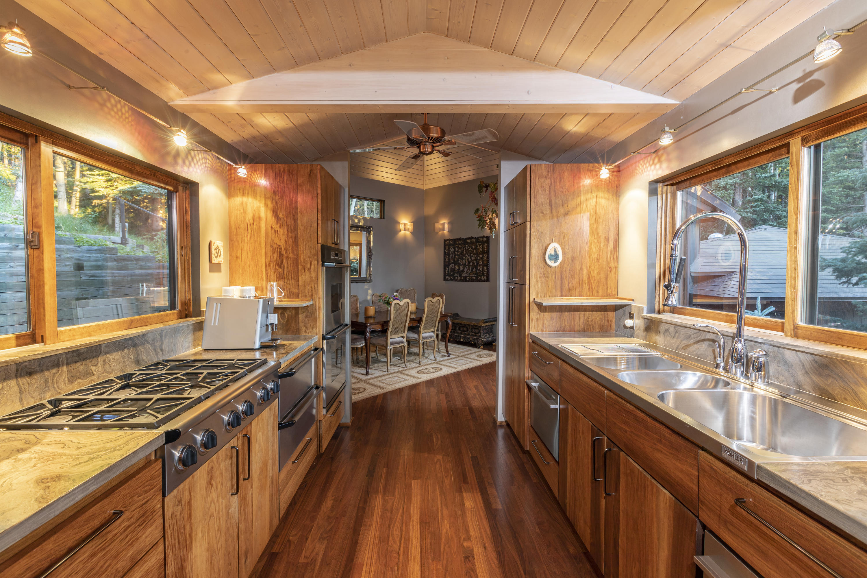 24 Sunset Circle Telluride, CO 81435 - Photo 16 of 39 a kitchen with sink stove and view living room