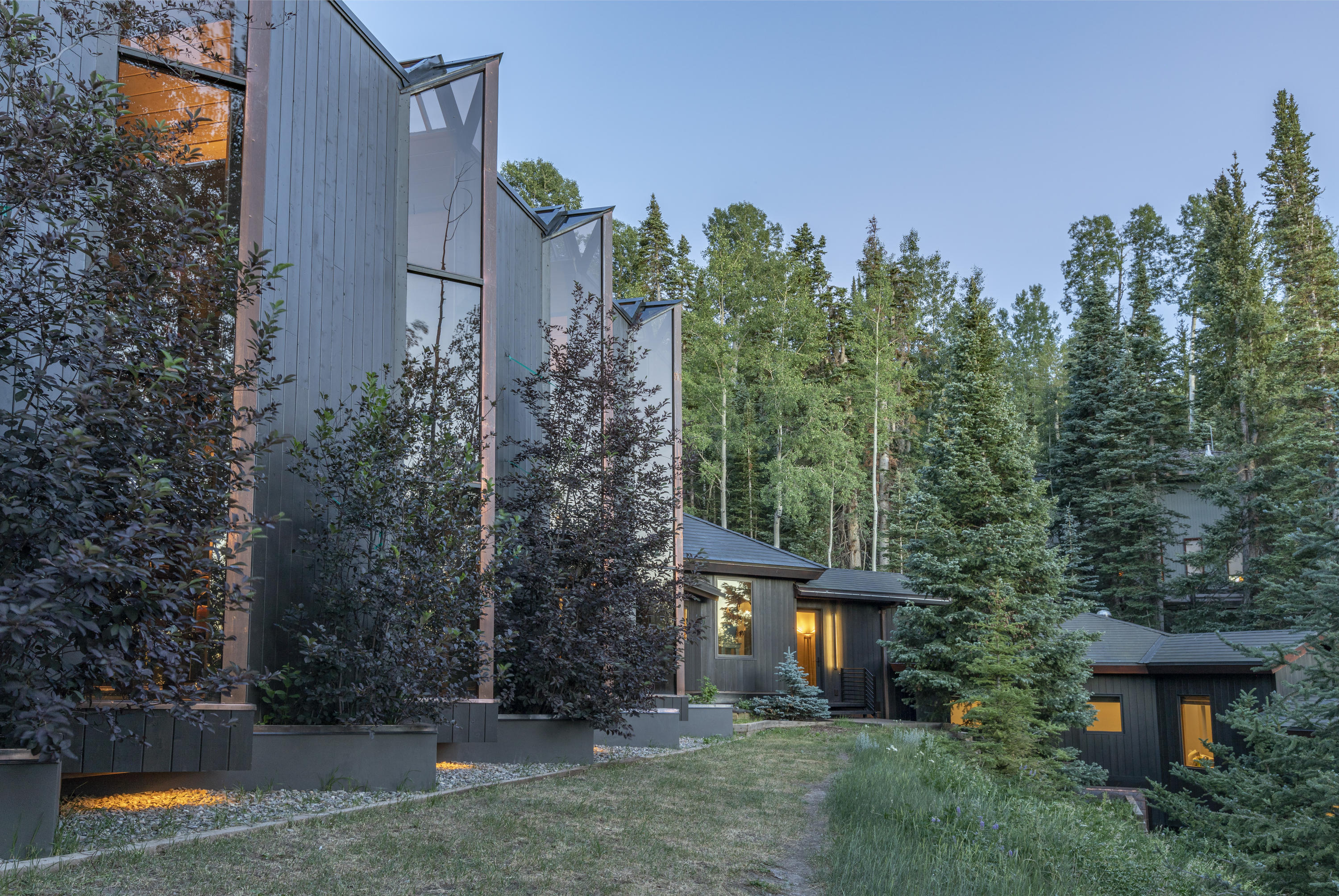 24 Sunset Circle Telluride, CO 81435 - Photo 26 of 39 aerial view of a house with large trees and plants