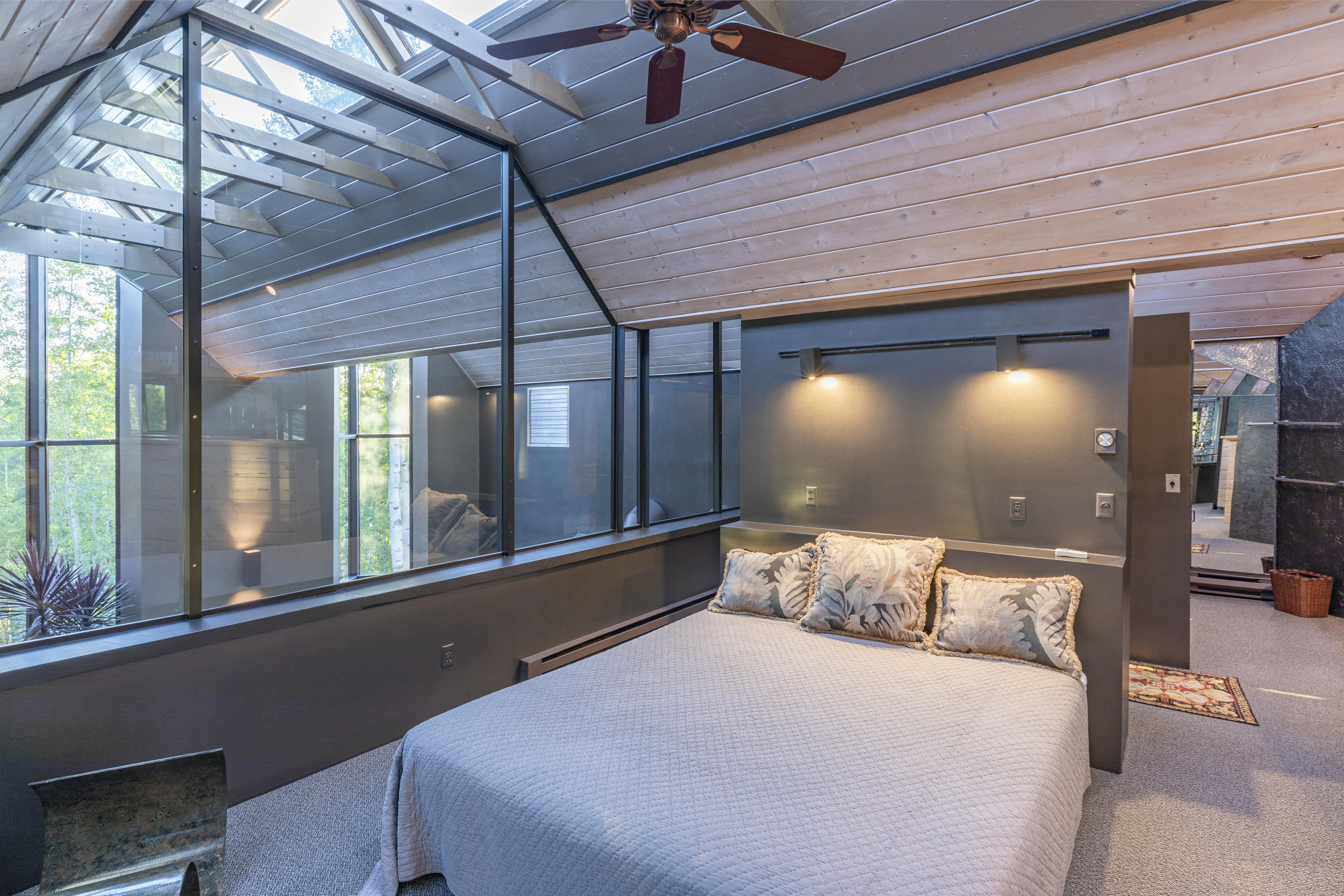 24 Sunset Circle Telluride, CO 81435 - Photo 31 of 39 a bed room with a bed and a large window