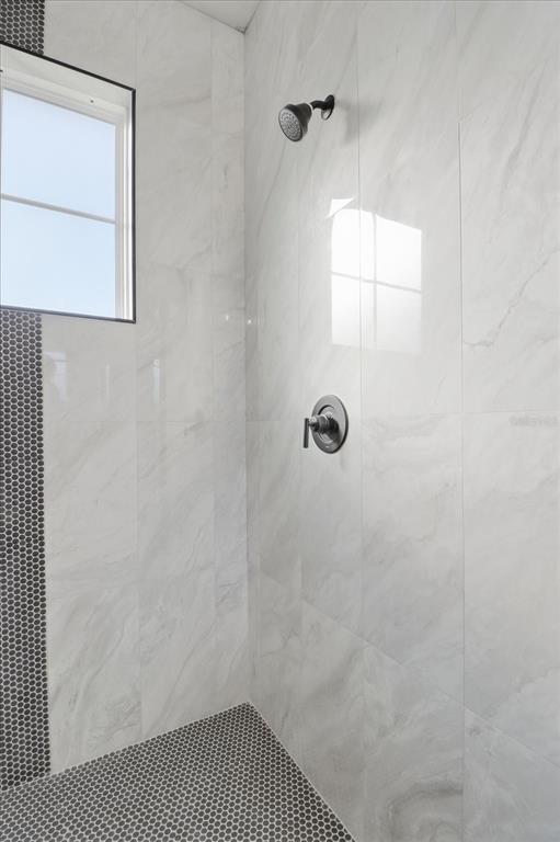 13250 Southwest 79th Circle Ocala, FL 34473 - Photo 22 of 44 a bathroom with a shower