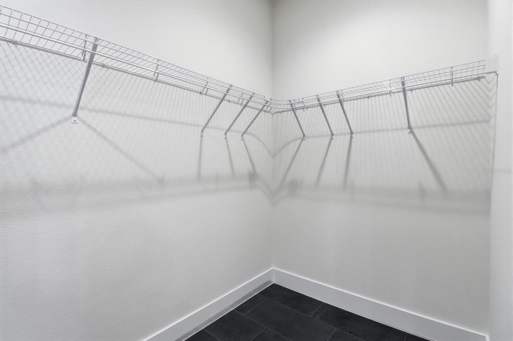 13250 Southwest 79th Circle Ocala, FL 34473 - Photo 23 of 44 a view of a room with racks on the wall