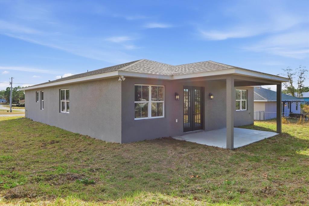 13250 Southwest 79th Circle Ocala, FL 34473 - Photo 40 of 44 a front view of house with yard