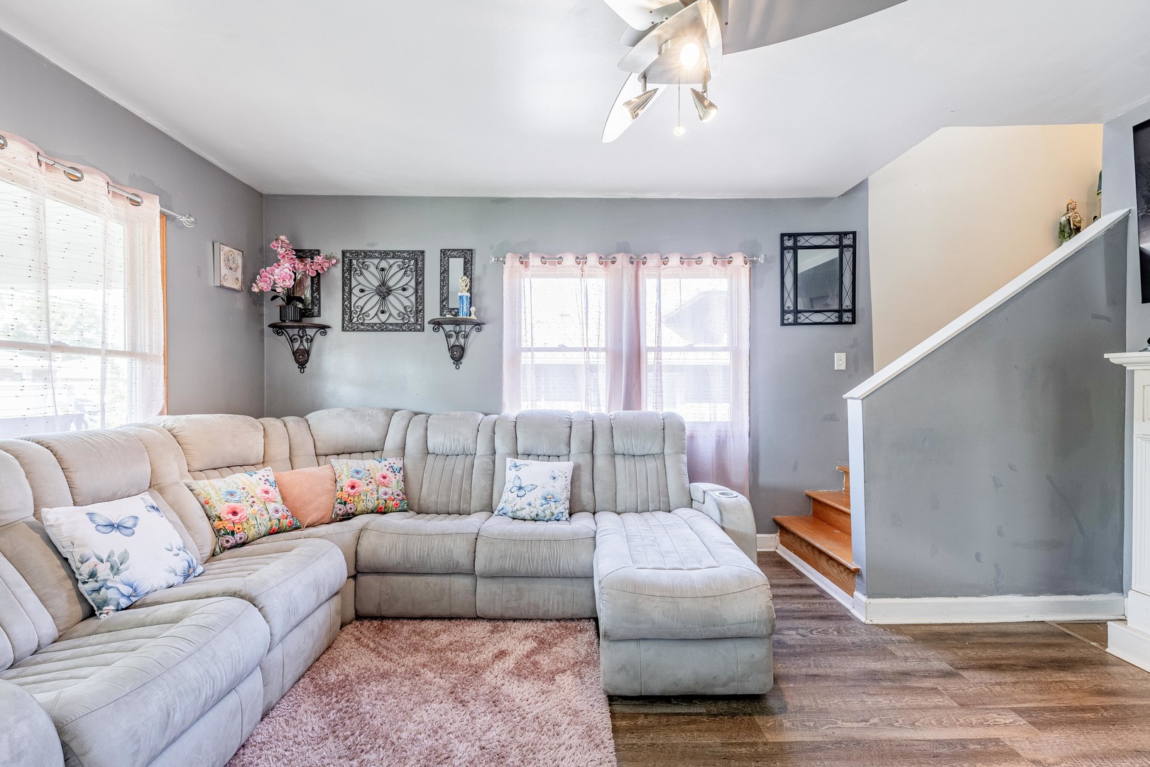 5844 West Maple Avenue Berkeley, IL 60163 - Photo 11 of 46 a living room with furniture and a window